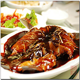 Fish cooked in vinegar gravy